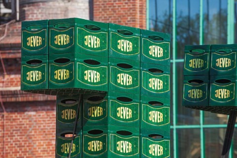 Stacked Jever beer crates in front of the Frisian Brewery, Jever Brewery, Jever, East Frisia, Lower