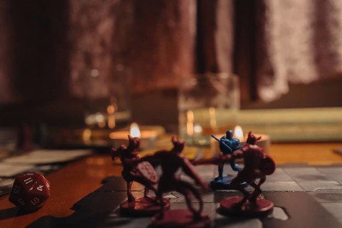 Dungeons and Dragons board game in the evening time