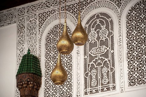 MARRAKECH, MOROCCO, ARIL 10, 2023, Three brass lamps in a typical palace in Marakesh, Morocco