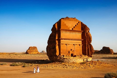 Saudis in front of the tomb of Lihyan, son of Kuza, Unesco site Maidan Saleh or Hegra, Al Ula,