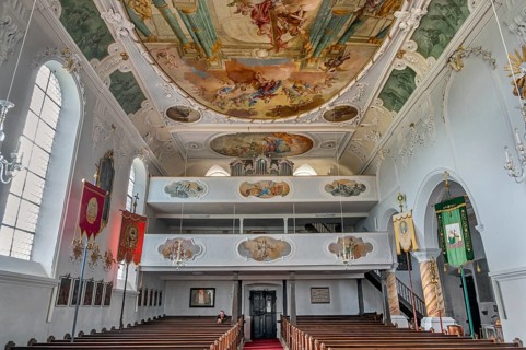 Organ loft and ceiling frescoes, St George and Florian is a listed Catholic parish church in