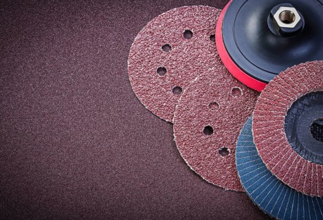 Sanding discs holder on polishing sheet abrasive materials