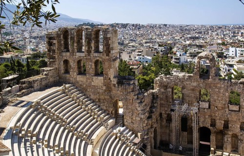 The Odeon of Herodes Atticus is a stone theatre structure located on the southwest slope of the