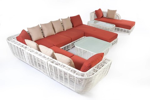 Suite of wicker furniture made of synthetic fibre on isolated background