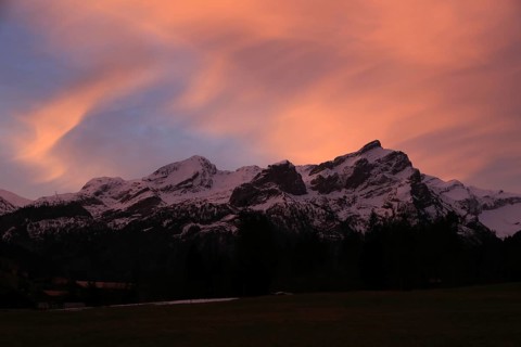 Sky on fire, sunrise scene in Gsteig near Gstaad