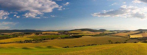 Panorama landscape - Amazing view from golf course to the valley at sunset