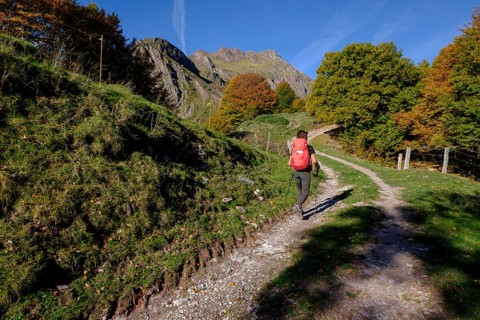 Solitary woman walking on the Arlet route, Camille path, pyrenees national park, pyrenees