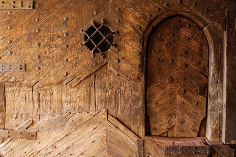 Castle gate with medieval wooden door