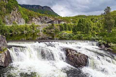 Magnificent seething waterfall - threshold on the river Bioreio. The river flows in western Norway.