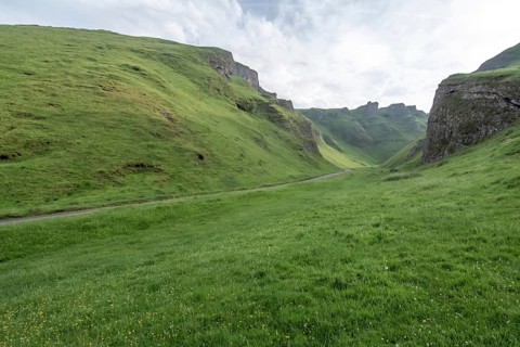 Winnats pass is a hill pass and limestone valley in the peak district of derbyshire, England,