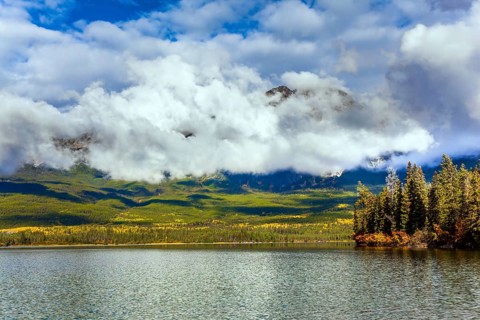 The lake is covered with light water ripples. Pyramid Lake. Cold sunny day in the Rocky Mountains