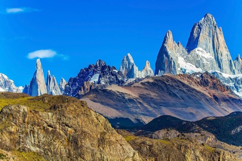 Picturesque mountain range, illuminated by the midday sun. Fitzroi - mountain peak in Patagonia in