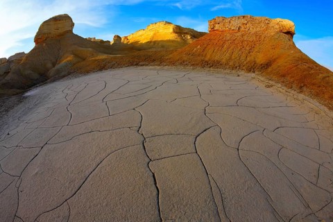 Ancient mountains and the dry ground in desert of Israel, photographed by an objective the Fish eye
