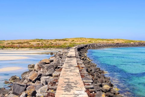 Causeway to the Griffiths Island at the mouth of the Moyne River, Port Fairy, Victoria, Australia