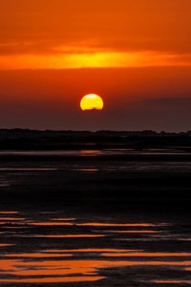 Beautiful golden coloured sunset at the seaside on the Isle Borkum