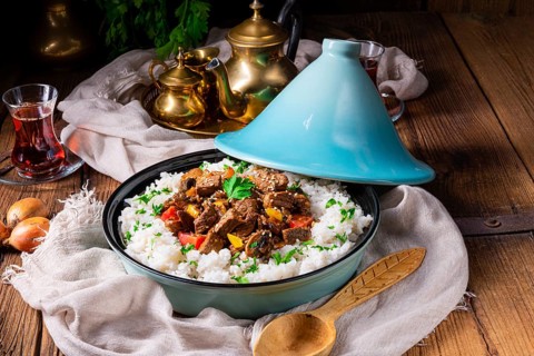 Tajin beef stew with rice, peppers and sesame seeds