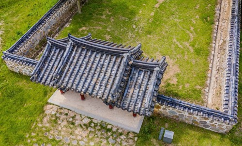 Cheongju, South Korea, May 31, 2020: Aerial view of roof top of gate and wall at shrine of