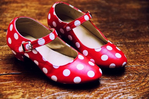 Red dance shoes with white dots
