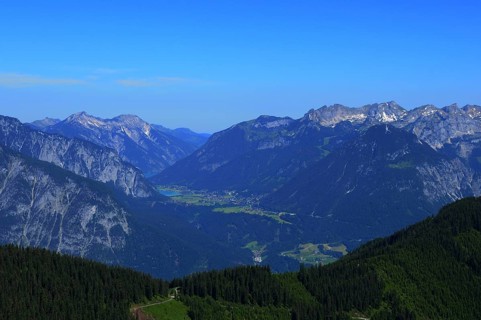 Paragliding above Spieljoch in the Zillertal valley viewing to the Inn valley