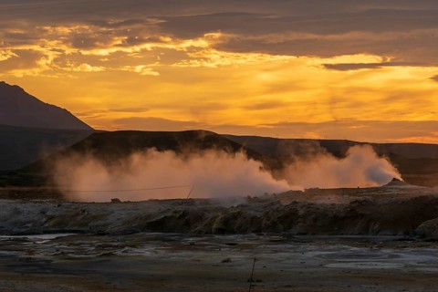 Backlit fumaroles at sunrise, Hverarönd / Hverir geothermal area, Norðurland eystra, Iceland