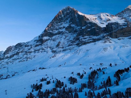 Eiger North Face Mountain at Sunset in Winter. Evening Twilight, Blue Hour. Swiss Alps. Switzerland