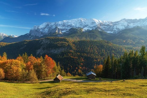 Fall colors and snow on the mountain peak near garmisch partenkirchen. Taken from Mountain Eckbauer