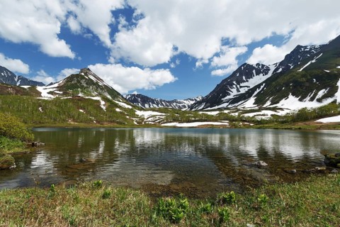 Scenery summer landscape of Kamchatka: beautiful view of Mountain Range Vachkazhets, mountain lake