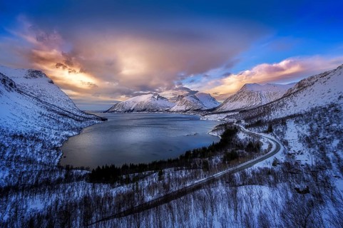 Beautiful winter landscape scene, sunset or sunrise in mountains and fjords