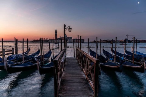 Dawn, Venetian gondolas with the church of San Giorgio Maggiore in the background, Venice, UNESCO