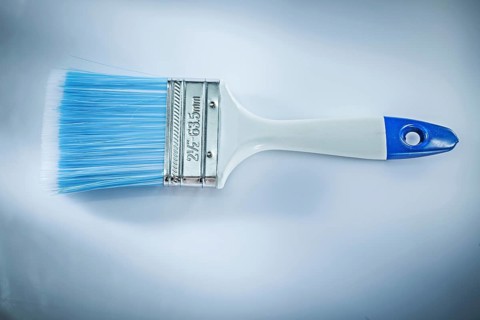 Paintbrush on white background top view
