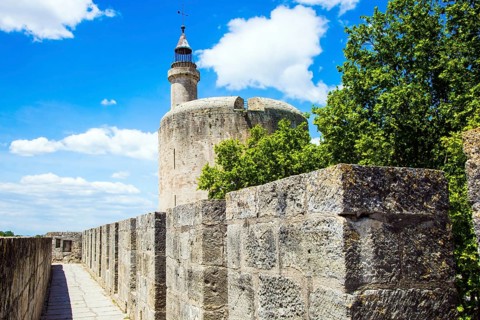 Antique walls of the medieval port city of Aigues-Mortes. The historic tower of Constance.