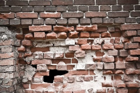 Old destroyed brick wall