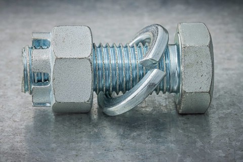 Mounted Screw Bolt And Nut With Washer Engraver On Metal Steel Plate
