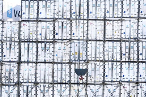 Stacked containers of the Danish logistics company Maersk on a container ship in the port of
