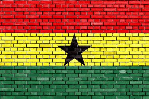 Flag of Ghana painted on brick wall
