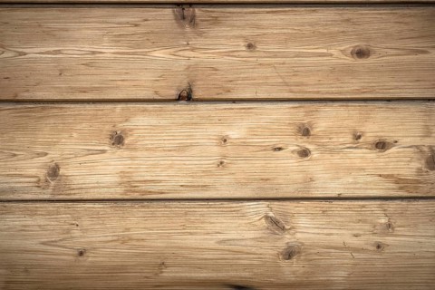 Background characterized by wooden planks rustic and warm hues