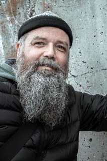 An image of a bearded man outdoor cold weather