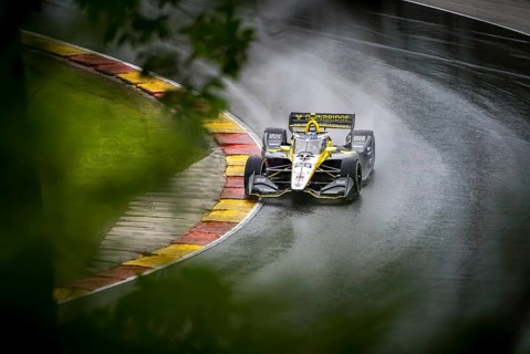 COLTON HERTA (26) of Valencia, California comes through turn 12 (Canada Corner) during a wet