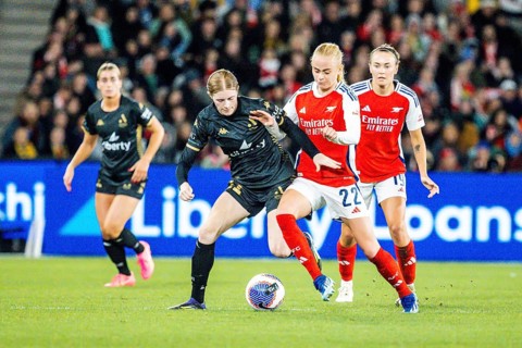 MELBOURNE, AUSTRALIA, MAY 24: Kathrine Kuhl of Arsenal Women FC competes against Cortnee Vine of
