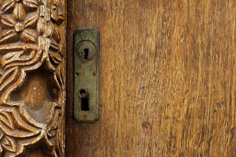 Antique ornaments on wooden door