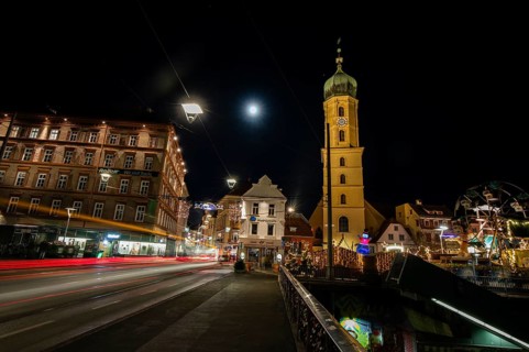 Christmas illuminated Mur bridge, behind Frnziskanerkirche, light trails, night shot, Graz, Styria,