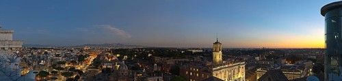 View on the Collosseum from Altare della Patria and the city in a panorama stitch