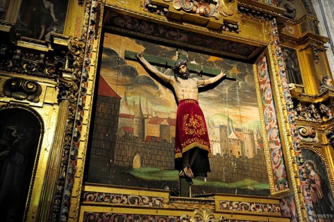 Crucifix in front of a painting in the cathedral, historic city centre, UNESCO World Heritage Site,