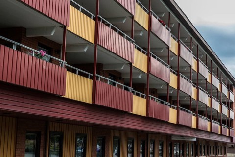 Bollnas city, Gavleborg County, Sweden, 08 04 2019- View over red and yellow residential apartments