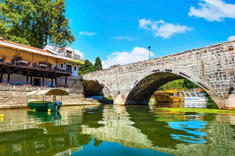 Stari Most on Crnojevicha river in Montenegro at sunny summer day