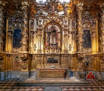 Segovia, Spain, 7 April, 2024: detail view of a gilded altar piece in a side chapel of the Segovia