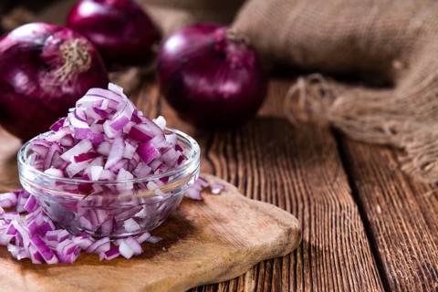 Portion of diced Red Onion (detailed close-up shot)