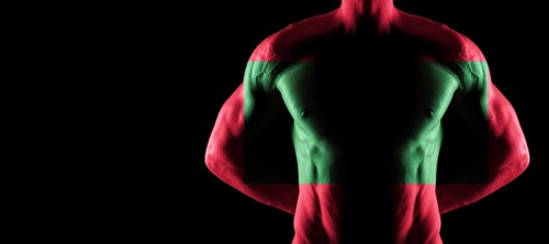 Maldives flag on muscled male torso with abs, black background