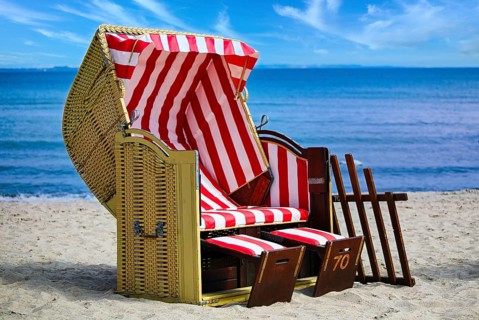 Beach chairs on Timmendorfer Strand on the Baltic sea with blue sky