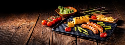Grilled krakauer with french fries and green salad